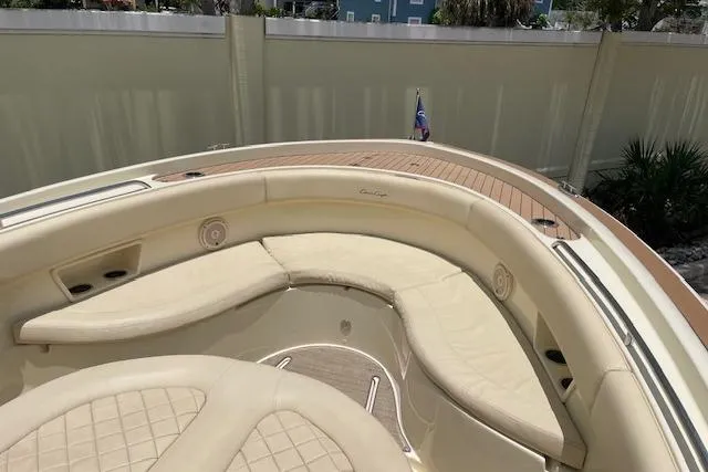  Yacht Photos Pics 2020 Chris-Craft Catalina 30 boat with luxurious beige seating and wooden deck.