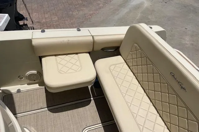  Yacht Photos Pics 2020 Chris-Craft Catalina 30 boat interior with beige quilted seating.