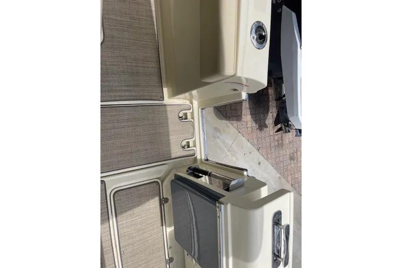  Yacht Photos Pics 2020 Chris-Craft Catalina 30 boat interior with beige flooring and sleek design.