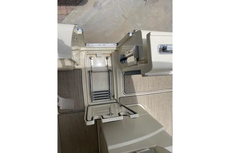  Yacht Photos Pics 2020 Chris-Craft Catalina 30 boat interior with ladder and storage compartments.