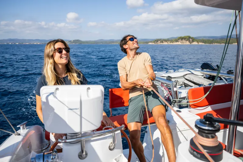 Tbd Yacht Photos Pics Couple sailing on Excess 11 catamaran, sunny day, 2026.