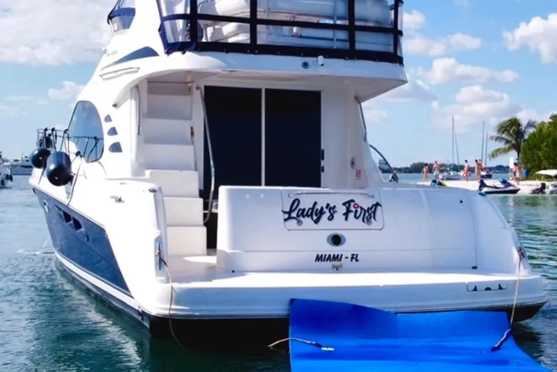  Yacht Photos Pics 2005 Sea Ray 420 Sedan Bridge yacht docked in Miami waters.