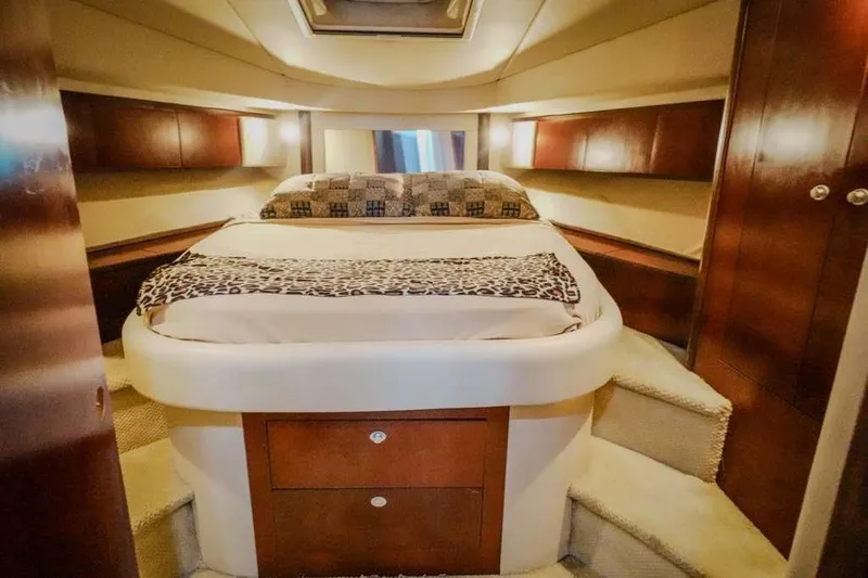 Yacht Photos Pics Luxurious bedroom interior of 2005 Sea Ray 420 Sedan Bridge yacht.