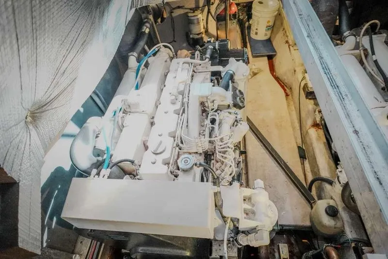  Yacht Photos Pics Engine compartment of 2005 Sea Ray 420 Sedan Bridge, showcasing detailed mechanical components.