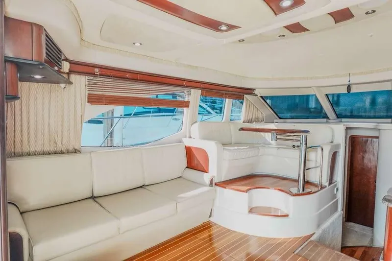  Yacht Photos Pics Luxurious interior of 2005 Sea Ray 420 Sedan Bridge yacht with elegant seating.