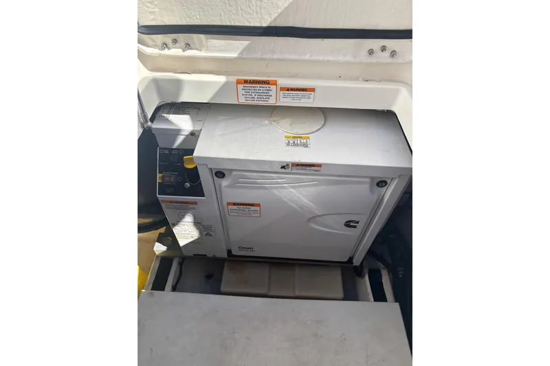 Fifth Child Yacht Photos Pics Cummins Onan generator in 2019 Back Cove 34O boat engine compartment.