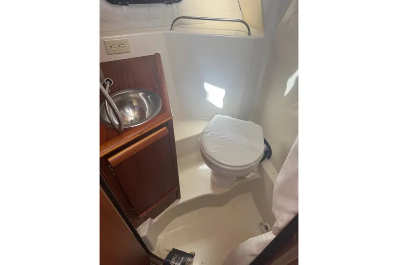  Yacht Photos Pics 2021 Ranger Tugs R-25 boat bathroom with sink and toilet.