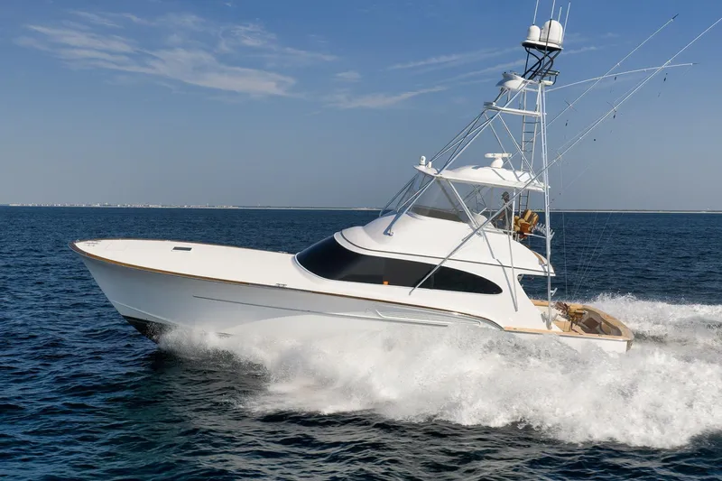Raise Em Up Yacht Photos Pics 2007 Sunny Briggs Custom Carolina Sportfish cruising on open water.