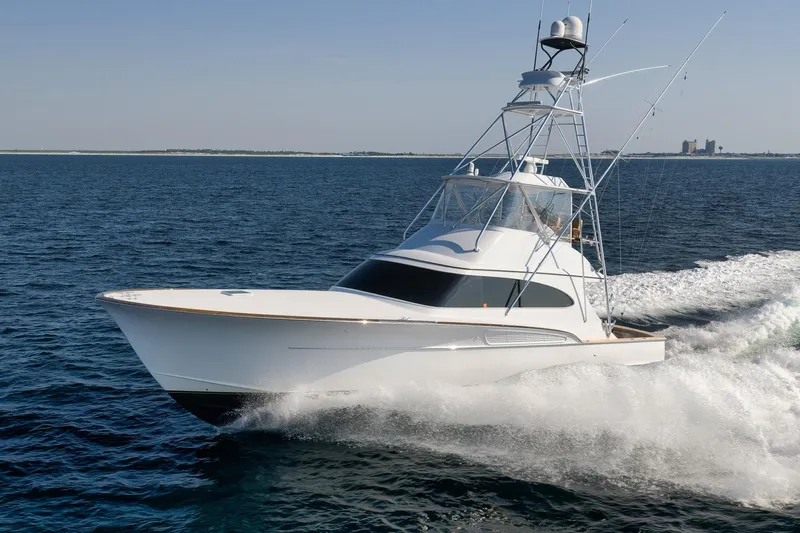 Raise Em Up Yacht Photos Pics 2007 Sunny Briggs Custom Carolina Sportfish yacht cruising on open water.