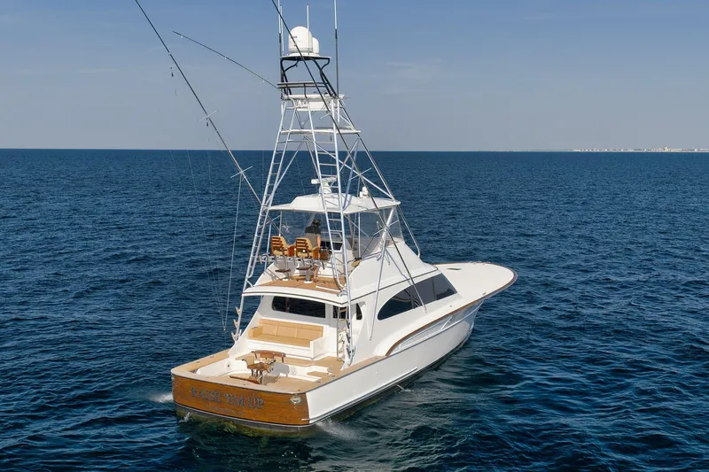 Raise Em Up Yacht Photos Pics 2007 Sunny Briggs Custom Carolina Sportfish yacht cruising on open sea.