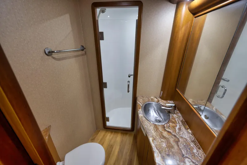 Raise Em Up Yacht Photos Pics Luxurious bathroom in 2007 Sunny Briggs Custom Carolina Sportfish yacht with marble countertop.