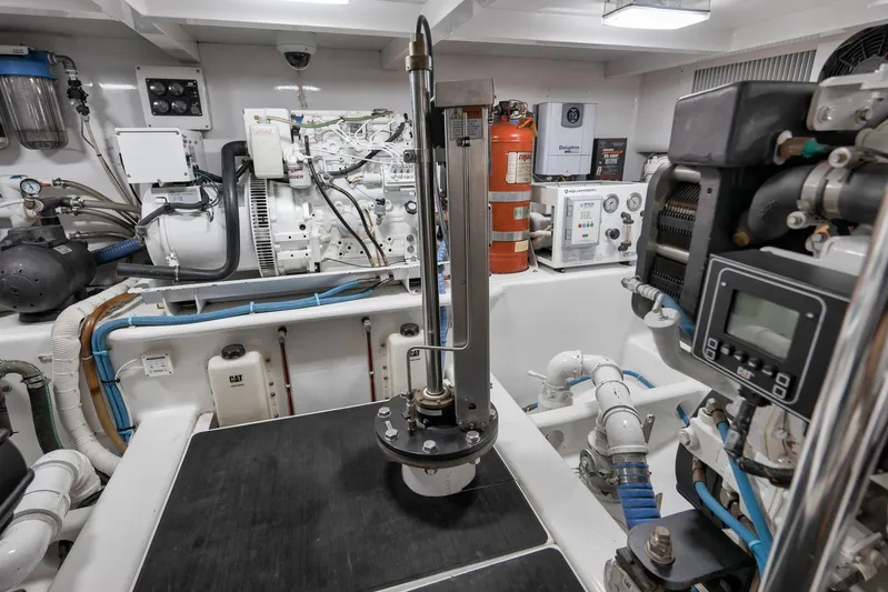 Raise Em Up Yacht Photos Pics Engine room of 2007 Sunny Briggs Custom Carolina Sportfish, featuring advanced marine equipment.