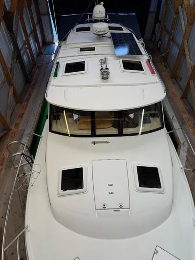 Cannery Row Yacht Photos Pics 2015 Cutwater C-30 Sedan boat in storage, top view showing deck and cabin features.