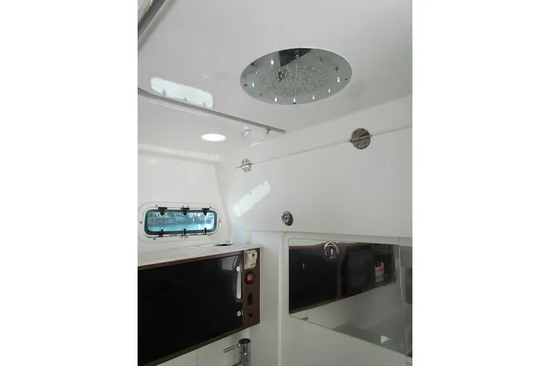  Yacht Photos Pics Interior of 2016 Everglades 435 Center Console boat, featuring sleek design and modern amenities.