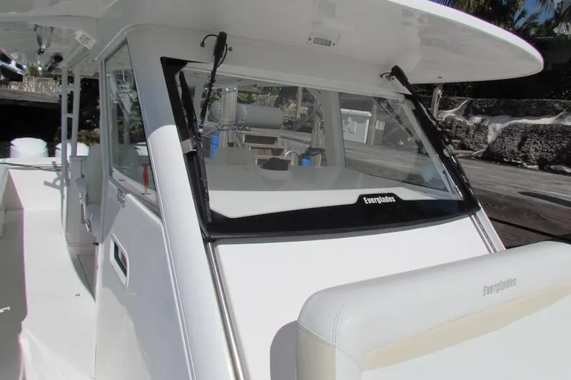  Yacht Photos Pics 2016 Everglades 435 Center Console boat, showcasing sleek design and spacious deck.