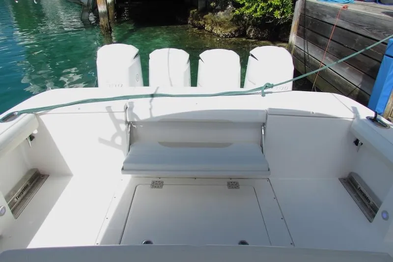  Yacht Photos Pics 2016 Everglades 435 Center Console boat interior with seating and outboard motors.