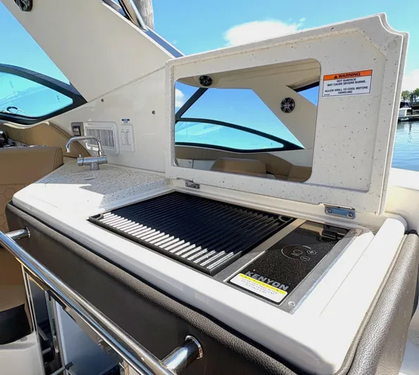  Yacht Photos Pics Outdoor kitchen on 2020 Sea Ray 320 Sundancer yacht with grill and sink.