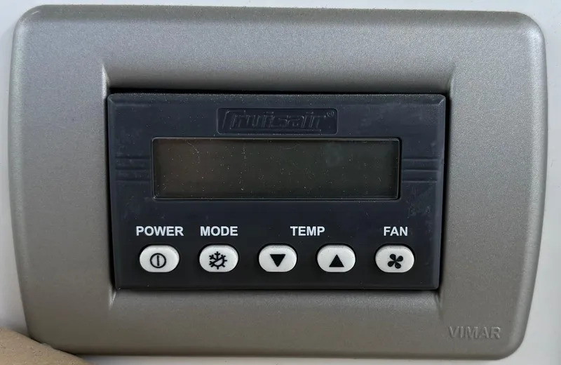  Yacht Photos Pics Control panel on a 2020 Sea Ray 320 Sundancer boat, featuring power, mode, temp, and fan buttons.