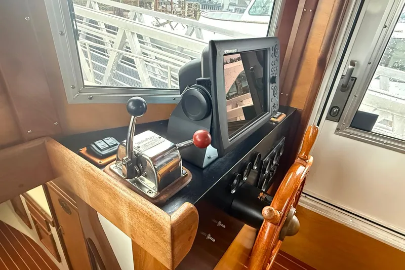  Yacht Photos Pics Control panel of a 1996 Devlin 38 boat with navigation equipment.