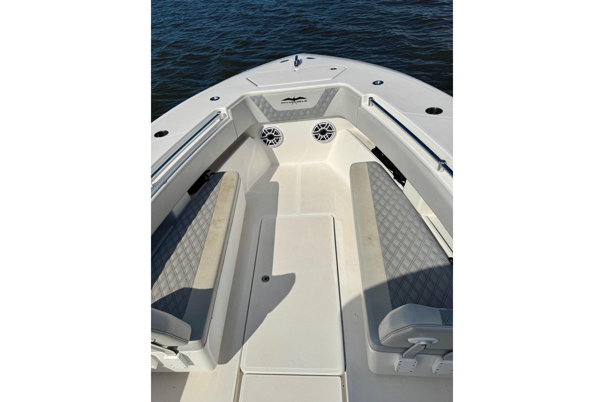 2020 Invincible 36 Open Fisherman boat interior with cushioned seating and ocean view.