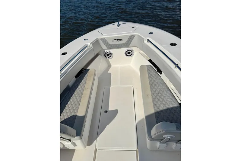  Yacht Photos Pics 2020 Invincible 36 Open Fisherman boat interior with cushioned seating and ocean view.