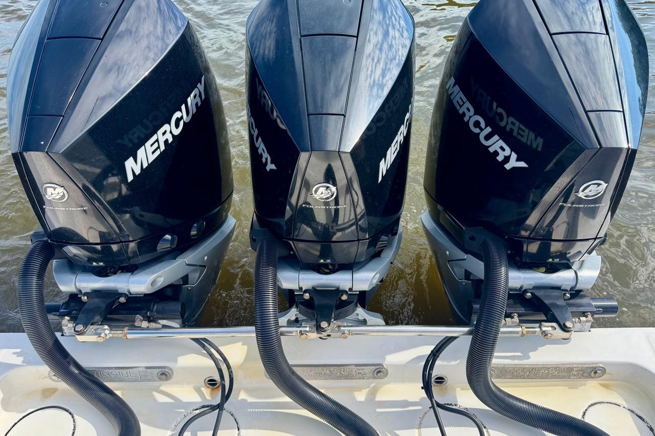 Triple Mercury outboard engines on a 2020 Invincible 36 Open Fisherman boat.