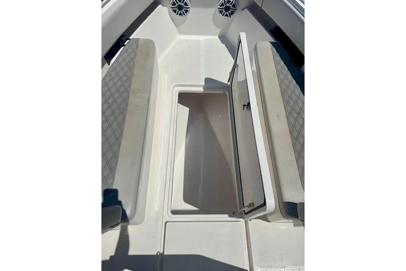  Yacht Photos Pics 2020 Invincible 36 Open Fisherman boat interior with open storage compartment.