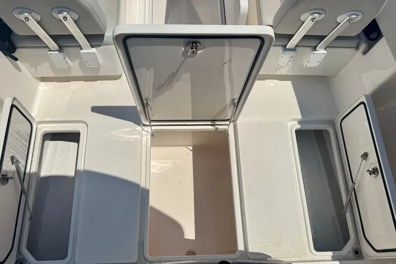  Yacht Photos Pics 2020 Invincible 36 Open Fisherman boat storage compartments with open hatches.