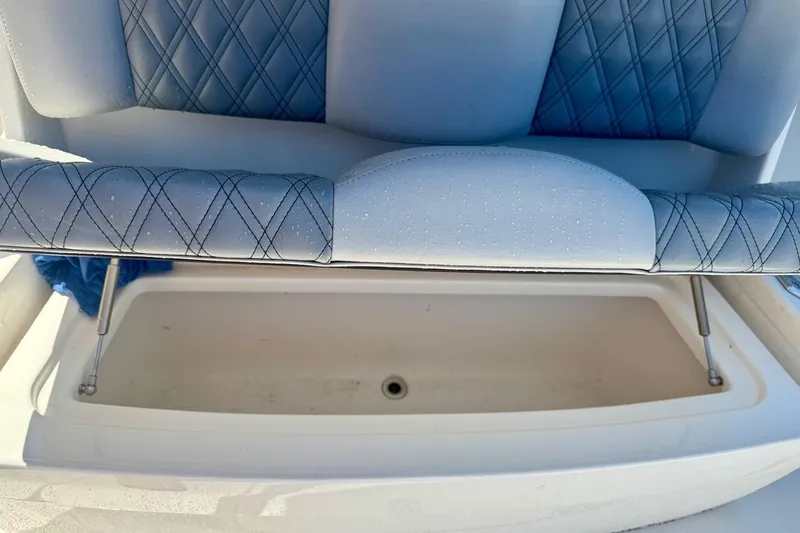  Yacht Photos Pics 2020 Invincible 36 Open Fisherman seat with storage compartment.