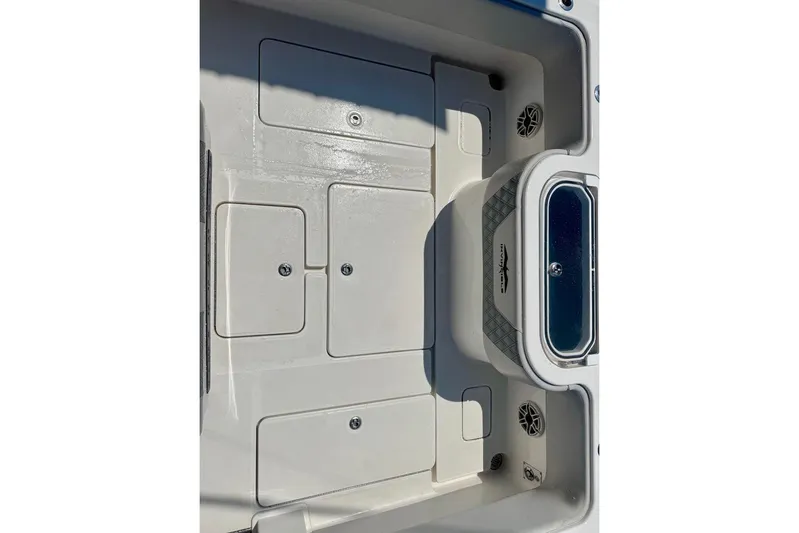  Yacht Photos Pics 2020 Invincible 36 Open Fisherman boat deck with storage compartments and livewell.