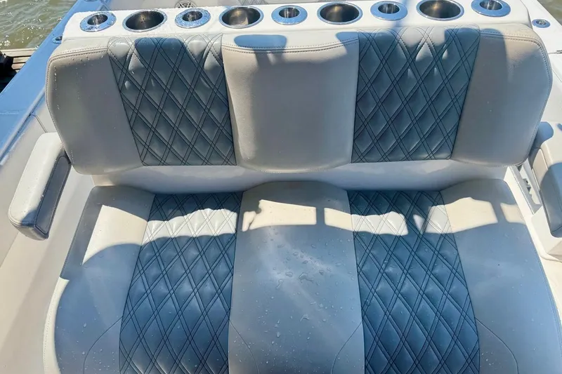  Yacht Photos Pics Luxurious seating on 2020 Invincible 36 Open Fisherman boat with cup holders.