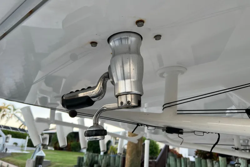  Yacht Photos Pics Close-up of a 2018 Regulator 28 boat's fishing rod holder and reel handle.