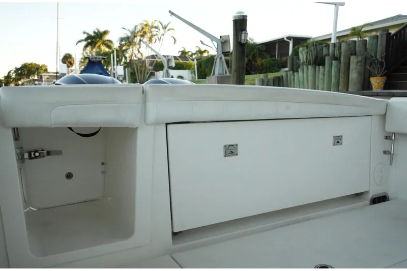  Yacht Photos Pics 2018 Regulator 28 boat storage compartments with sleek white design.