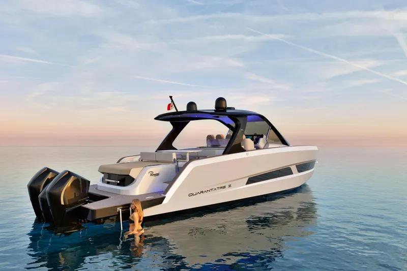  Yacht Photos Pics Luxury 2026 Ranieri QUARANTATRE Z yacht on serene water at sunset.