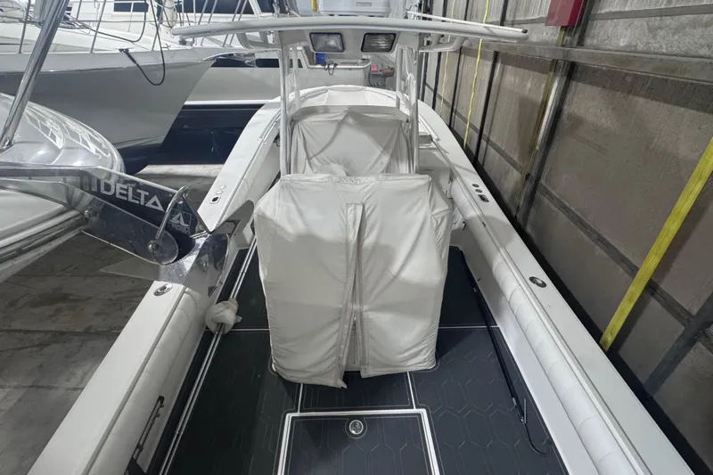  Yacht Photos Pics 2010 Regulator 34SS boat with covered console, docked indoors.