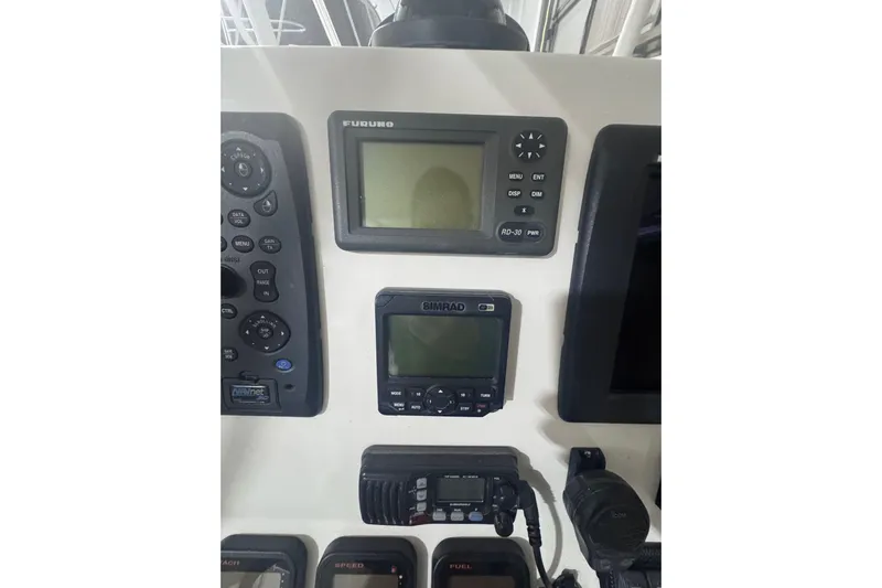  Yacht Photos Pics Control panel of a 2010 Regulator 34SS boat with navigation equipment.