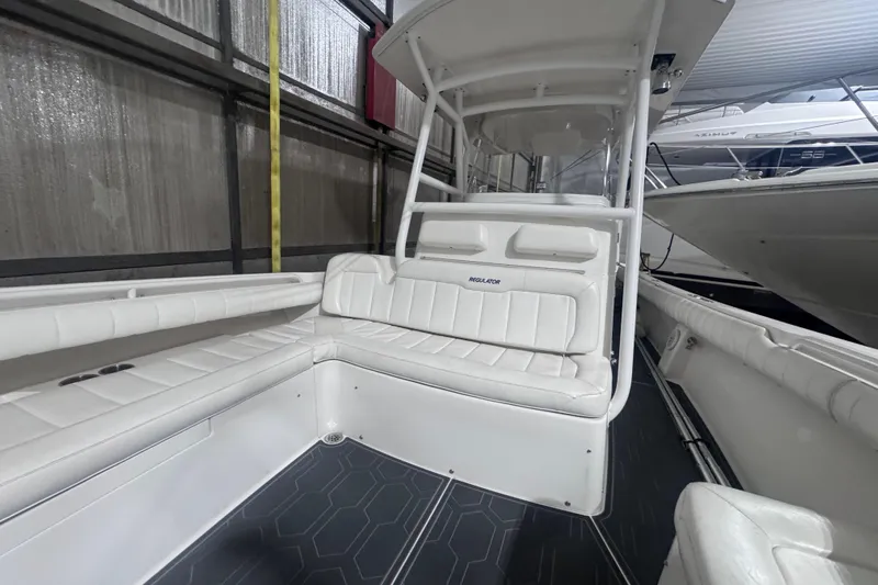  Yacht Photos Pics 2010 Regulator 34SS boat interior with white seating and modern design.