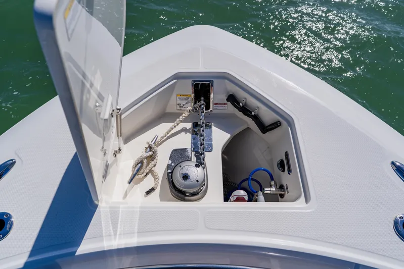 Spec-tacular Li Li Yacht Photos Pics 2019 Boston Whaler 380 Outrage anchor locker with rope and winch, on calm water.