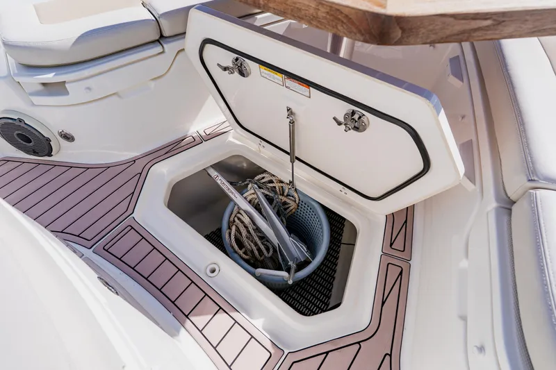 Spec-tacular Li Li Yacht Photos Pics 2019 Boston Whaler 380 Outrage storage compartment with ropes and anchor.