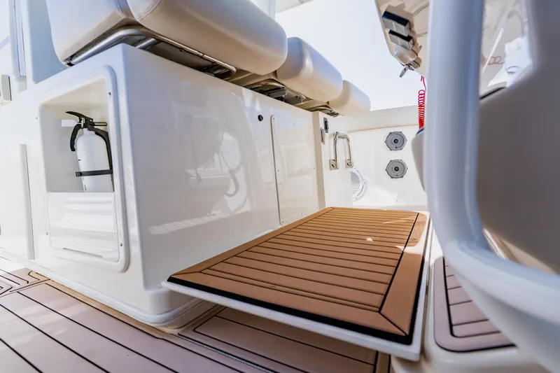 Spec-tacular Li Li Yacht Photos Pics 2019 Boston Whaler 380 Outrage interior with seating and safety equipment.