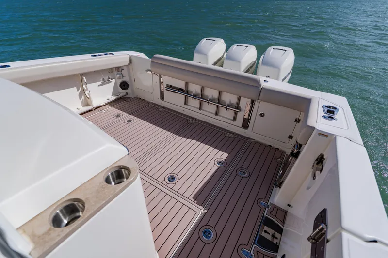 Spec-tacular Li Li Yacht Photos Pics 2019 Boston Whaler 380 Outrage boat deck with triple outboard engines.