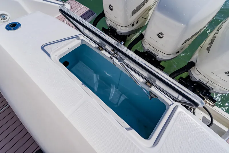 Spec-tacular Li Li Yacht Photos Pics 2019 Boston Whaler 380 Outrage livewell and outboard engines on deck.
