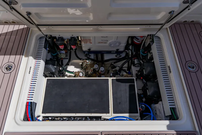 Spec-tacular Li Li Yacht Photos Pics 2019 Boston Whaler 380 Outrage engine compartment, showcasing detailed mechanical components.