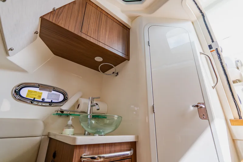 Spec-tacular Li Li Yacht Photos Pics 2019 Boston Whaler 380 Outrage cabin interior with sink and storage.