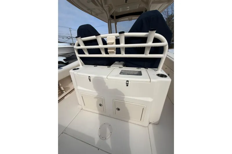  Yacht Photos Pics 2019 Grady-White Canyon 306 boat interior with storage compartments and seating.