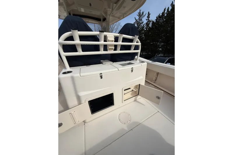  Yacht Photos Pics 2019 Grady-White Canyon 306 boat interior with storage compartments and seating.