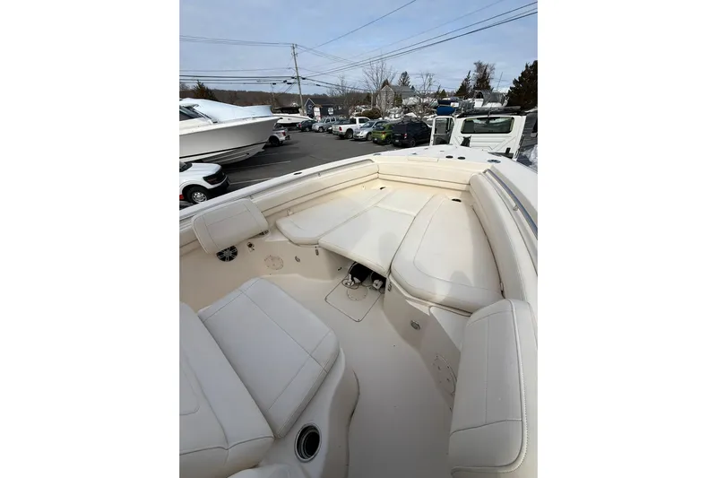  Yacht Photos Pics 2019 Grady-White Canyon 306 boat interior with white seating and spacious layout.
