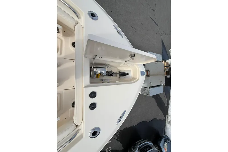  Yacht Photos Pics 2019 Grady-White Canyon 306 boat anchor compartment, open on a trailer.