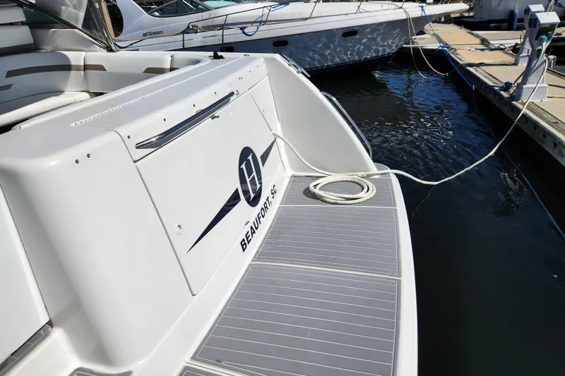 H Yacht Photos Pics 2000 Formula 41 Performance Cruiser docked, featuring sleek design and branding.