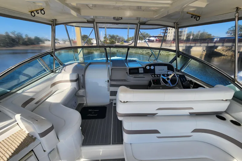 H Yacht Photos Pics 2000 Formula 41 Performance Cruiser interior with helm, seating, and water view.